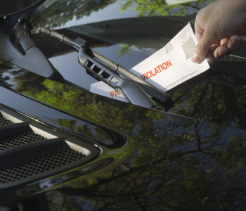 parking ticket on car windscreen